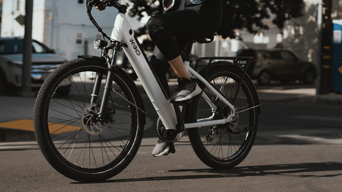 Riding an electric city bike down the street