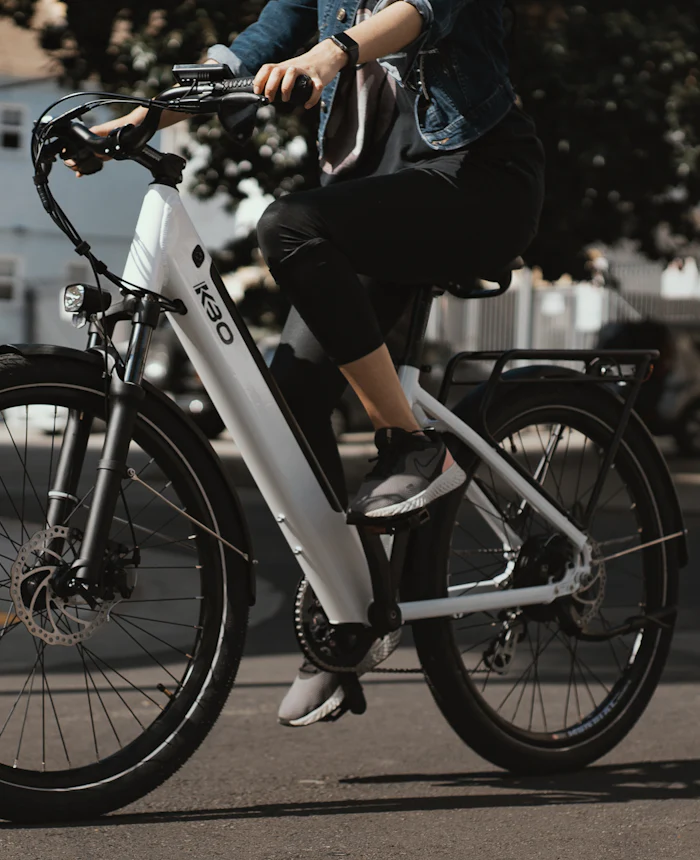 Electric city bike being ridden
